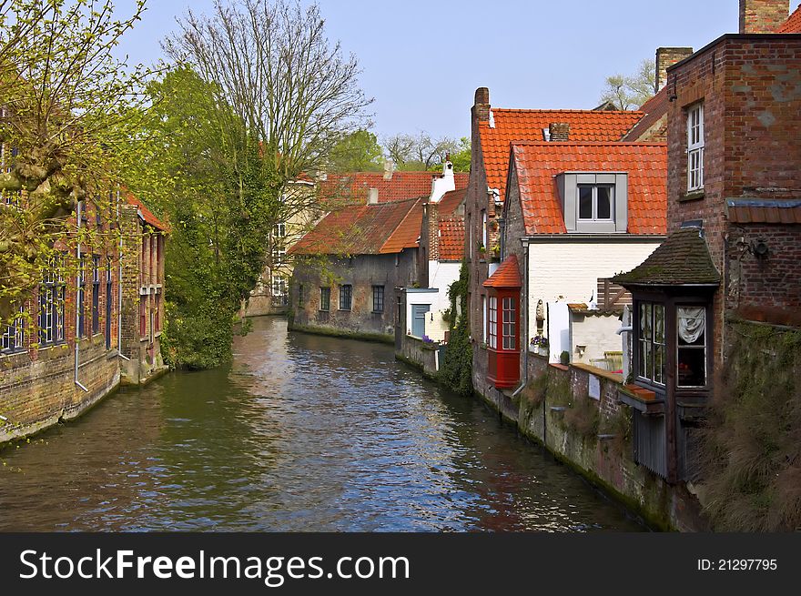 Classic view of channels of Bruges. Belgium. Medieval fairytale city. Summer urban landscape.