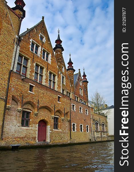 Classic view of channels of Bruges. Belgium. Medieval fairytale city. Summer urban landscape.