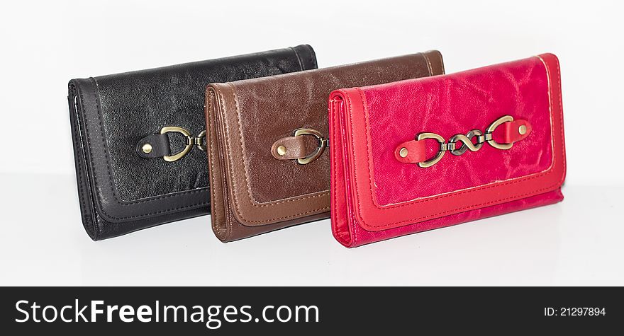Black, brown and red women leather wallets. Black, brown and red women leather wallets