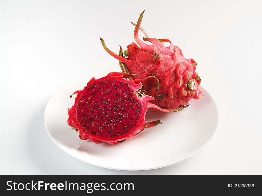 Drangon fruit - red color on a white background.