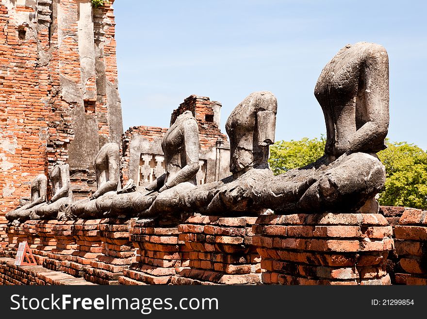 Row of headless buddha statue in wat chaiwattanaram, ayutthaya, thailand