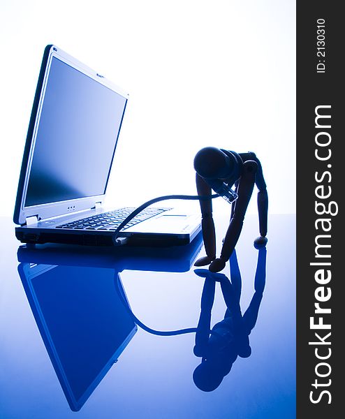Laptop with figure over white background. Laptop with figure over white background.