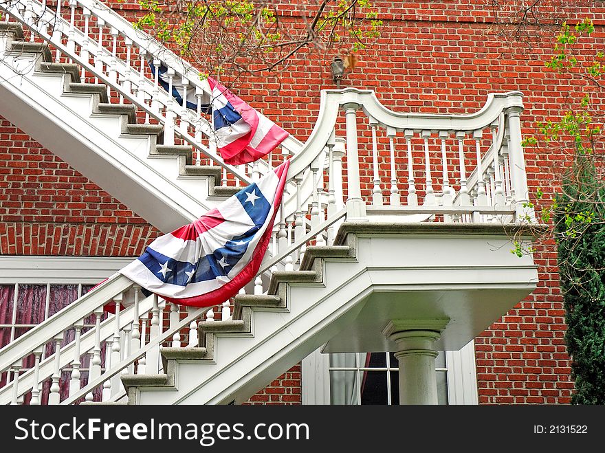 Landing on wooden, outside staircase of historical building. Landing on wooden, outside staircase of historical building