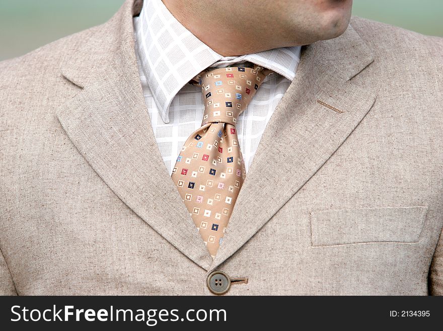 A businessman, clothing. Closeup of a tie and shirt