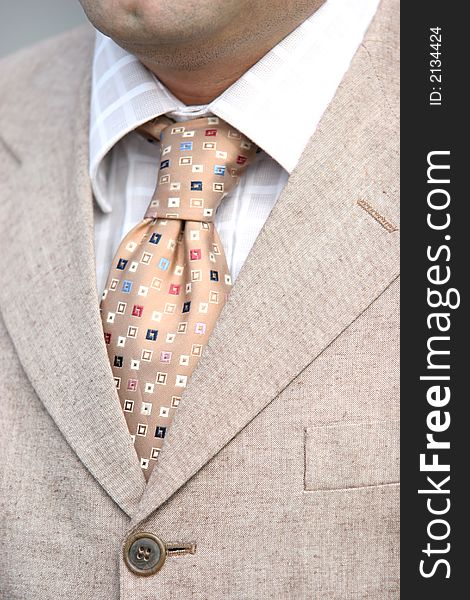 A businessman, clothing. Closeup of a tie and shirt