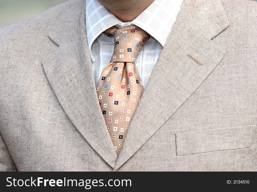 A businessman, clothing. Closeup of a tie and shirt