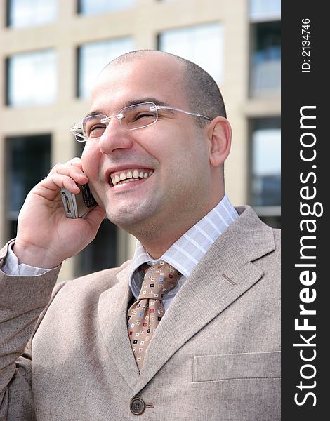 A businessman calling by mobile phone