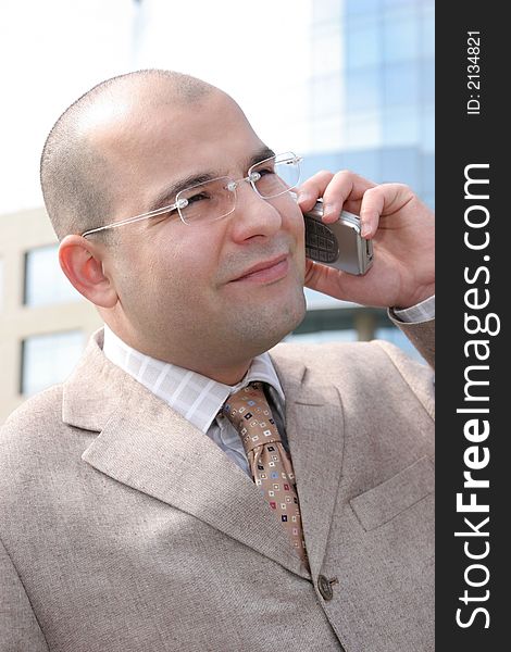 A businessman calling by mobile phone