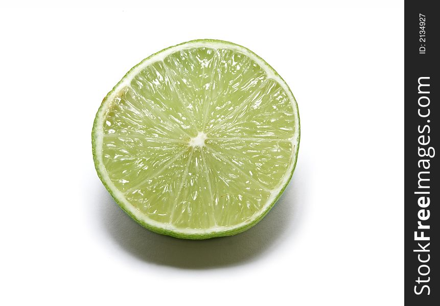Halth of green sour lime isolated on white background. Halth of green sour lime isolated on white background
