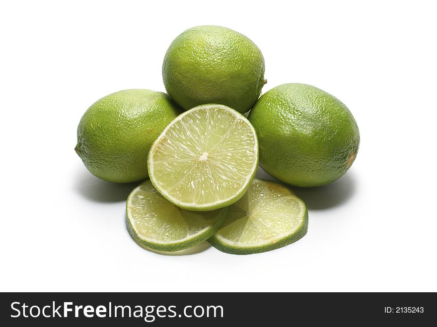 Green sour limes isolated on white background