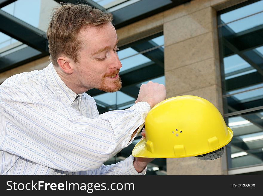 Details an successful architect cleaning helmet