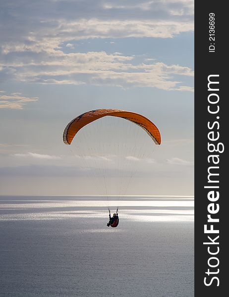 A parasailer soars over the Pacific in La Jolla, California. A parasailer soars over the Pacific in La Jolla, California