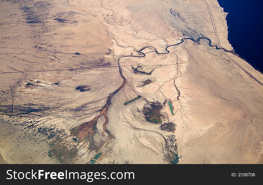 An aerial view of the Dos Palmas Spring flowing into the Salton Sea