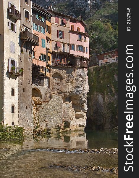 The medieval city constructed on rocks about the mountain river. The medieval city constructed on rocks about the mountain river