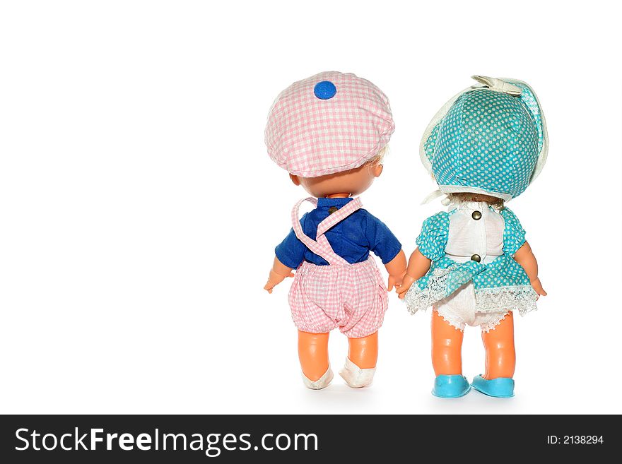 Picture of two typical 70´s dolls (made in Greece). Isolated on white (real white). Picture of two typical 70´s dolls (made in Greece). Isolated on white (real white)
