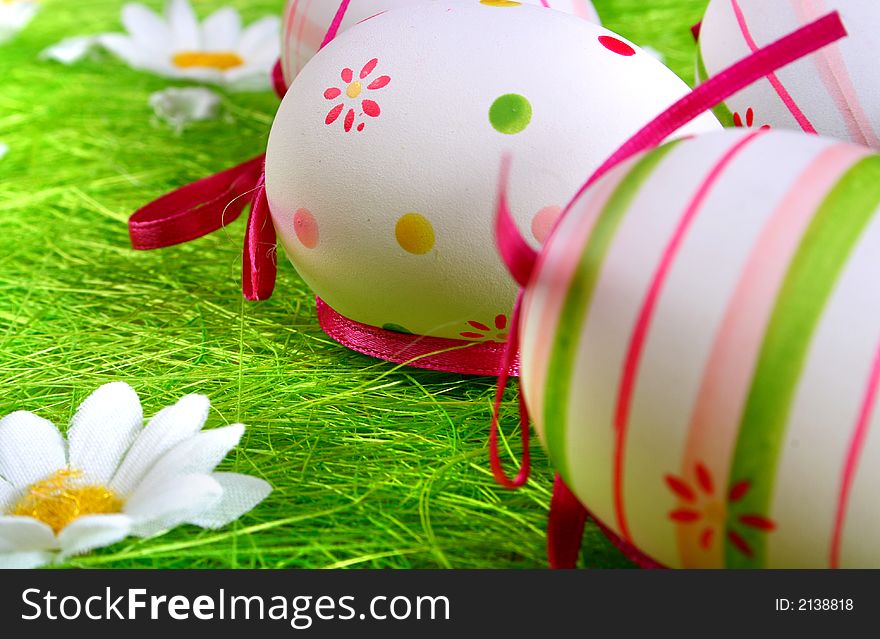 Easter eggs painted over green grass. Easter eggs painted over green grass.