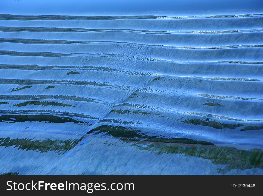 Blue Background with lines and water. Blue Background with lines and water