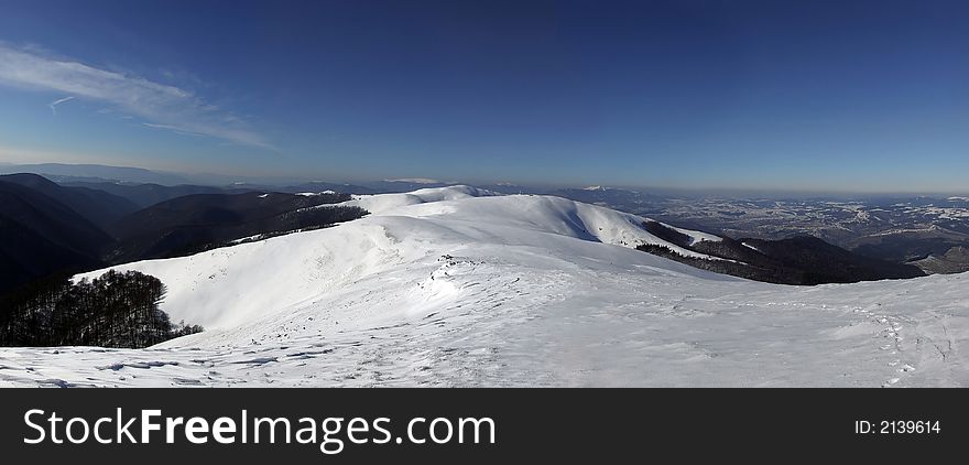 Panoramic picture of Carpathian mountain range in winter time. Panoramic picture of Carpathian mountain range in winter time
