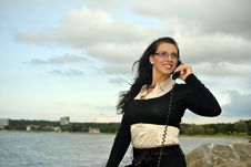 Girl With A Telephone Receiver In Hand Royalty Free Stock Photography Girl With A Telephone Receiver In Hand Royalty Free Stock Photography