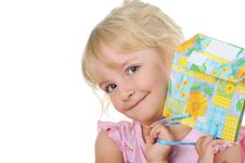 Little Cute Girl With Present Posing To Camera Royalty Free Stock Photography
