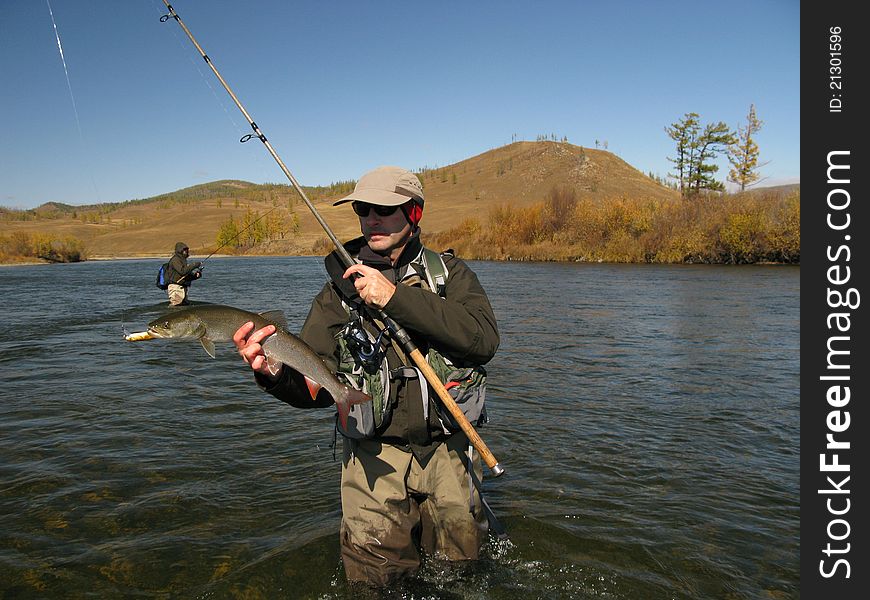 Fishing - fisherman catched big fish