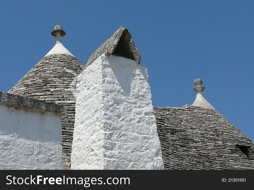 Typical roof of trulli in Alberobello, Italy during the summer. Typical roof of trulli in Alberobello, Italy during the summer