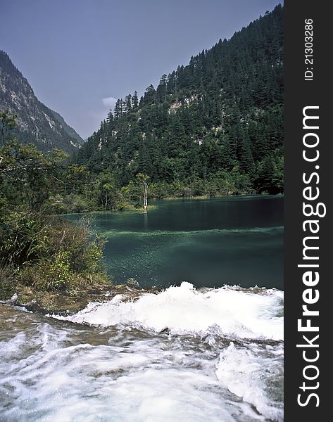 Waterfall and lake in the Jiuzhaigou National Park, China