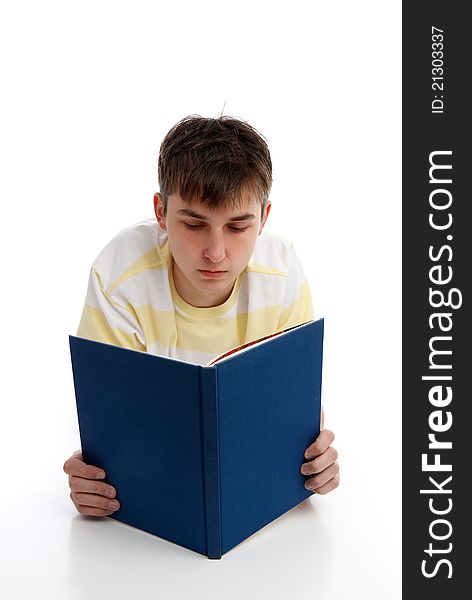 A boy reading a book, textbook, studying, learning or recreational.  White background. A boy reading a book, textbook, studying, learning or recreational.  White background.