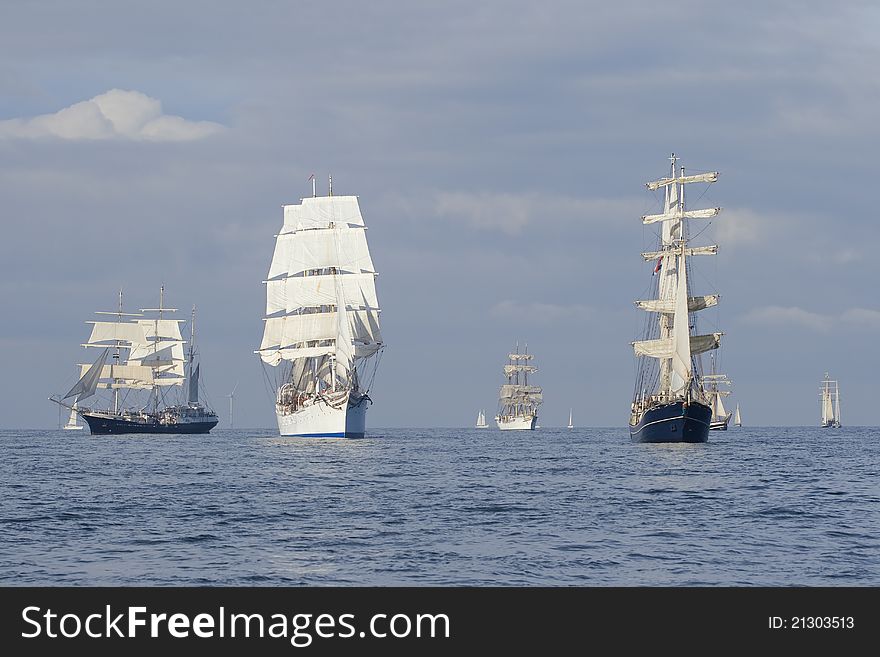 Several tall ships in a row before start a regatta. Several tall ships in a row before start a regatta