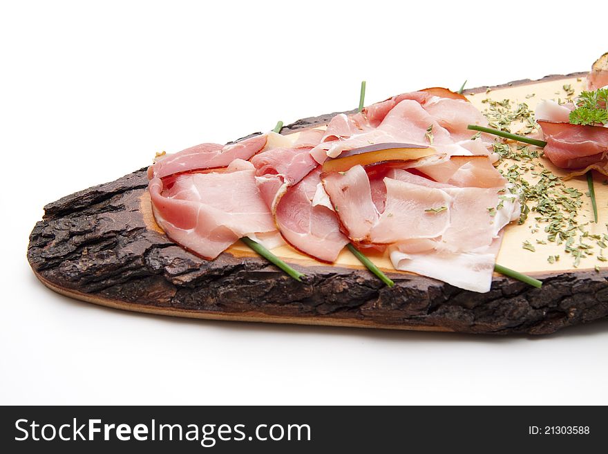Ham on wooden board with herbs. Ham on wooden board with herbs