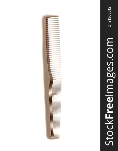 Plastic comb for hair over white background