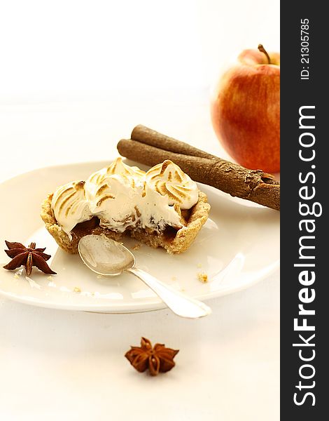 Apple meringue tart isolated on a white backround