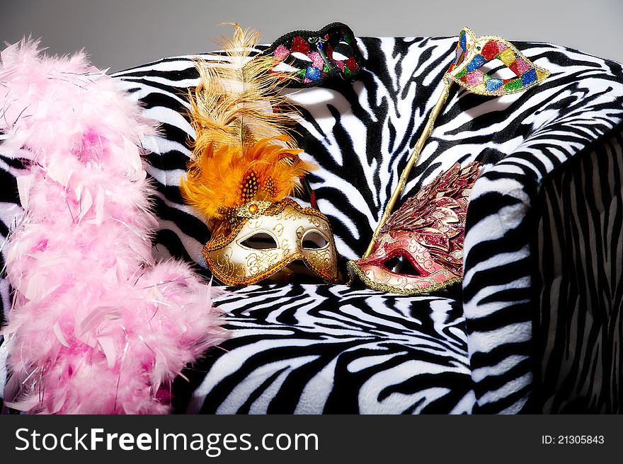 Bright Masquerade Masks On Retro Chair