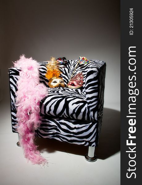 Bright Masquerade Masks On Retro Chair