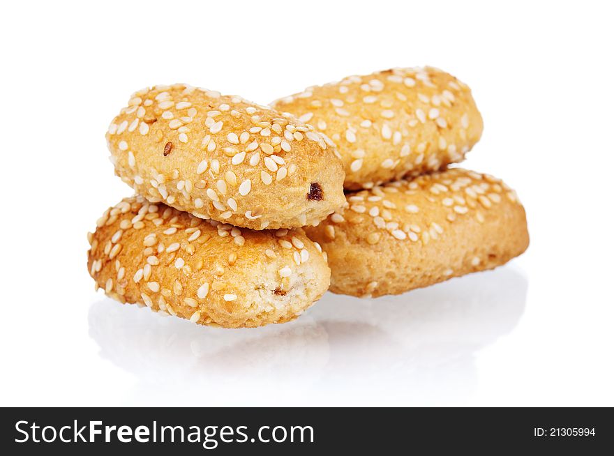 Pile of delicious cookies over white background