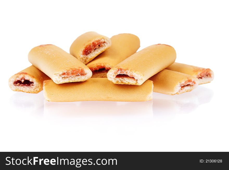 Pile of delicious cookies over white background