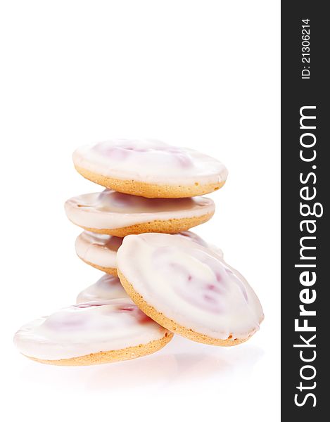 Pile of delicious cookies over white background