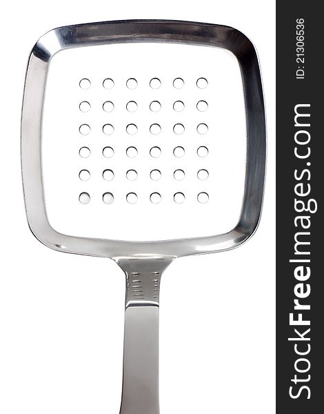 Close up view of kitchen utensil perforated spoon over white background. Close up view of kitchen utensil perforated spoon over white background