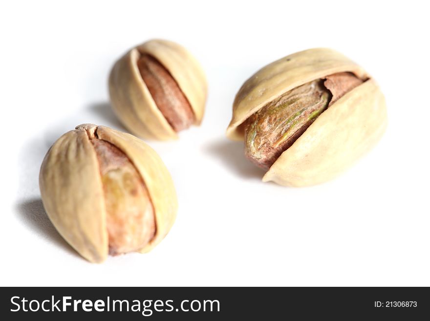 Pistachios isolated on white background