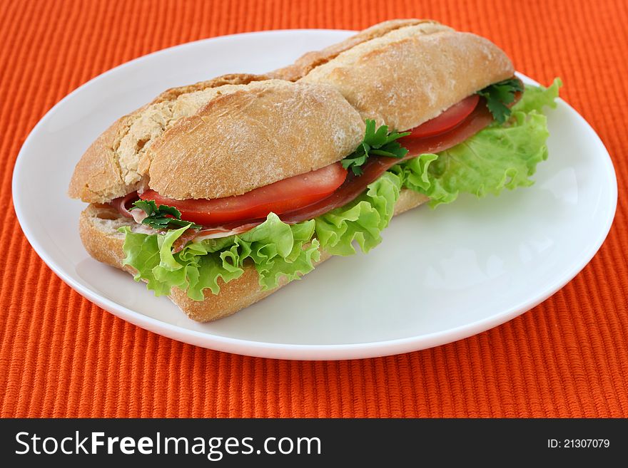 Sandwich with ham, tomato and lettuce. Sandwich with ham, tomato and lettuce
