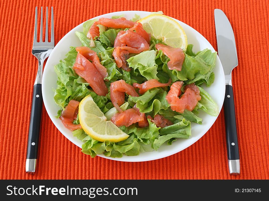 Salad with salmon and lemon