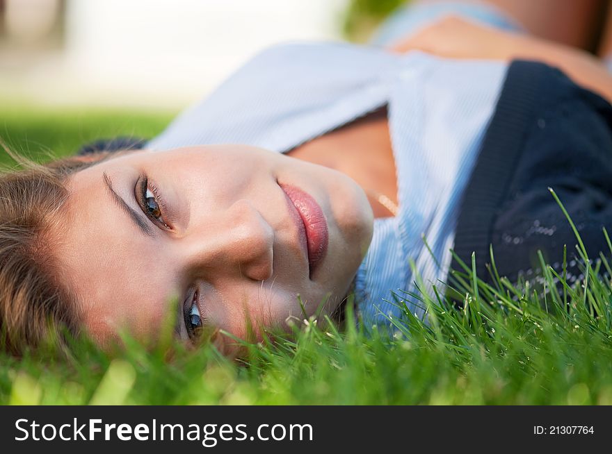 Portrait of beautiful caucasian teenager girl in park outdoors. Portrait of beautiful caucasian teenager girl in park outdoors