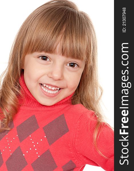 Portrait of a pretty little girl in sweater on white background