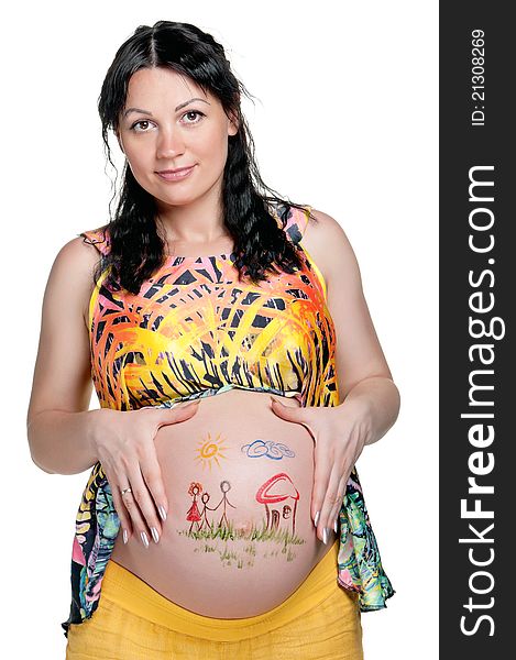 Tummy of pregnant woman with funny drawing over white background. Tummy of pregnant woman with funny drawing over white background