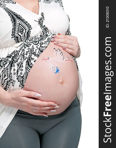 Tummy of pregnant woman with funny drawing over white background. Tummy of pregnant woman with funny drawing over white background