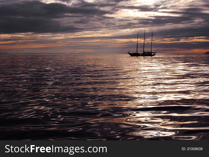 Sailboat in calm waters of Victoria, Canada. Sailboat in calm waters of Victoria, Canada.