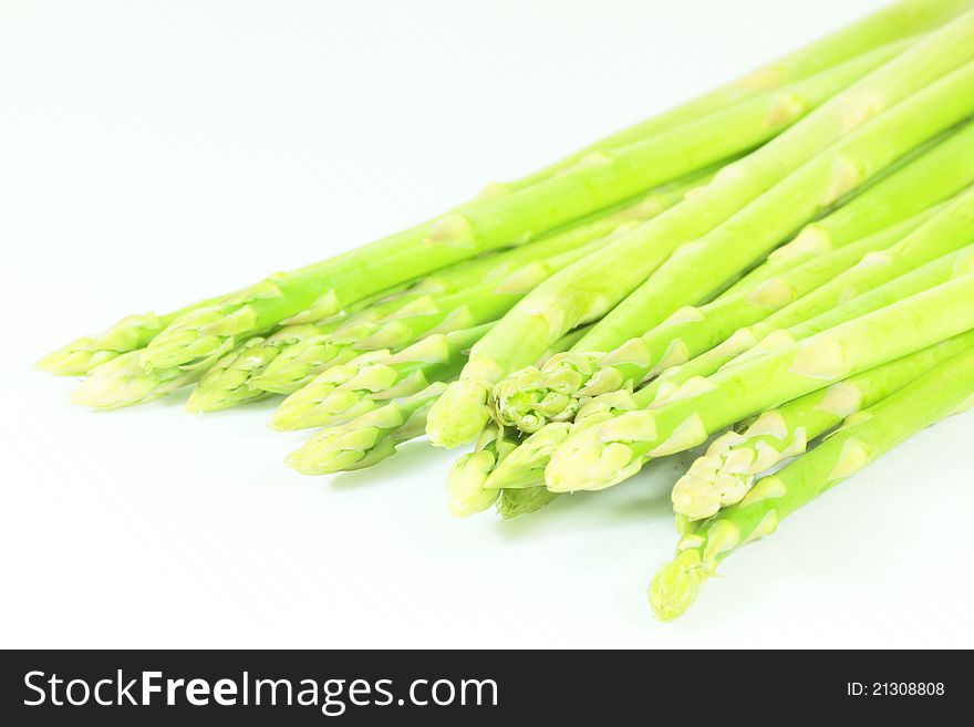 Green asparagus on a white background
