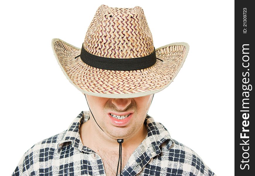 Cowboy hat pulled down over his eyes on a white background. Cowboy hat pulled down over his eyes on a white background.