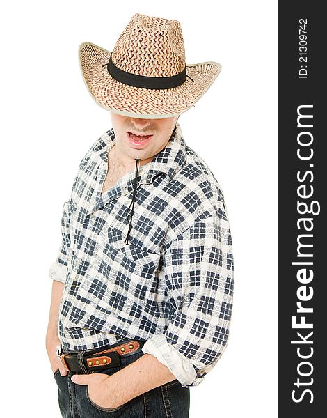 Cowboy hat pulled down over his eyes on a white background. Cowboy hat pulled down over his eyes on a white background.