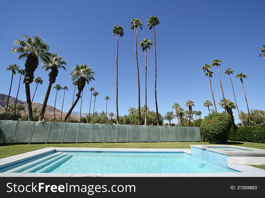 Pool with fence in Palm Springs, California. Pool with fence in Palm Springs, California.